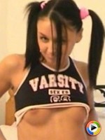 Watch as Lilly strips out of her cheerleader outfit