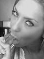 Webcam girl Ashley shows off her oral skills with her favorite toy