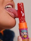 Alyssa shows off her amazing oral skills on a lollipop