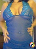 Krissys huge round tits are barely covered by her lace top