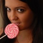 Sexy and very busty Southern Brooke shows off her oral skills on her pink lollipop