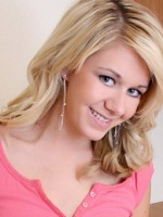 Watch as Ashlee strips out of her tiny pink shirt and black thong